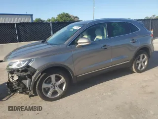 2017 Lincoln MKC Premiere with VIN 5LMCJ1C93HUL61309, listed as a Copart auction lot 57076365 with 82,706 mi miles and Salvage title. Bid and sale history available at DreamBid. Image 1.