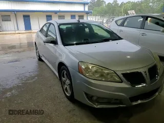 2009 Pontiac G6 GT 1SB z VIN 1G2ZK57K694233980, wystawiony jako Copart lot #54146815 z przebiegiem 96 973 mil mil oraz Szkoda całkowita • Salvage title. Historia ofert i sprzedaży dostępna na DreamBid. Obrazek 13.