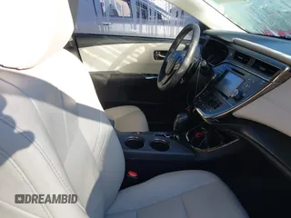 2016 Toyota Avalon Limited with VIN 4T1BK1EBXGU205973, listed as a IAAI auction lot 41206815 with 64,169 mi miles and . Bid and sale history available at DreamBid. Image 5.