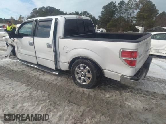 2014 Ford F-150 XL with VIN 1FTFW1CT3EKG17778, listed as a IAAI auction lot 41362619 with 122,963 mi miles. Bid and sale history available at carsss.com. Image 3.