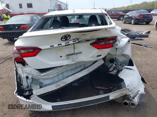2023 Toyota Camry SE with VIN 4T1G11AK7PU771765, listed as a IAAI auction lot 42060929 with 39,407 mi miles and . Bid and sale history available at DreamBid. Image 6.