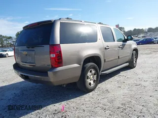 2011 Chevrolet Suburban LT with VIN 1GNSCJE00BR122636, listed as a IAAI auction lot 41594772 with 202,433 mi miles. Bid and sale history available at carsss.com. Image 4.