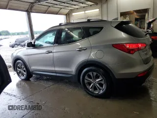 2014 Hyundai Santa Fe with VIN 5XYZU3LB1EG227984, listed as a Copart auction lot 59569905 with 102,477 mi miles and Salvage title. Bid and sale history available at DreamBid. Image 2.