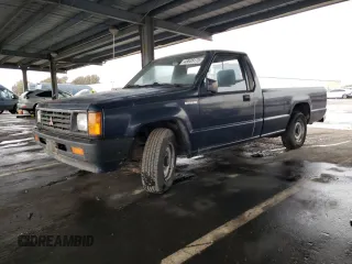 1988 Mitsubishi Mighty Max z VIN JA7FL29E9JP027859, wystawiony jako Copart lot #48638175 z przebiegiem 136 441 mil mil oraz Tytuł czysty. Historia ofert i sprzedaży dostępna na DreamBid. Obrazek 1.