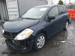 2008 Nissan Versa 1.8 SL with VIN 3N1BC13EX8L388854, listed as a IAAI auction lot 41448967 with 182,944 mi miles. Bid and sale history available at carsss.com. Image 18.