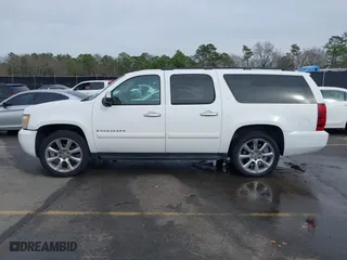 2008 Chevrolet Suburban LTZ with VIN 1GNFC16018R143195, listed as a IAAI auction lot 41577367 with 223,506 mi miles. Bid and sale history available at carsss.com. Image 14.