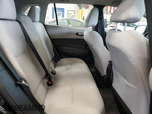 2023 Toyota Corolla Cross L with VIN 7MUAAABG8PV049431, listed as a Copart auction lot 56982055 with 20,275 mi miles and Salvage title. Bid and sale history available at DreamBid. Image 11.
