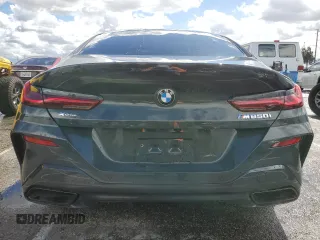2025 BMW 8 Series M850i with VIN WBAGV8C07SCT18237, listed as a Copart auction lot 49277375 with 750 mi miles and Salvage title. Bid and sale history available at DreamBid. Image 6.
