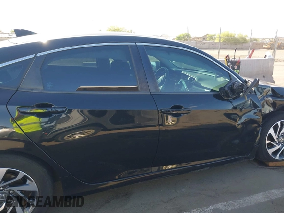 2018 Honda Civic EX with VIN 19XFC2F74JE021802, listed as a IAAI auction lot 42031745 with 102,986 mi miles and . Bid and sale history available at DreamBid. Image 12.