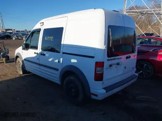 2013 Ford Transit Connect XLT with VIN NM0LS6BN2DT170025, listed as a IAAI auction lot 41679792 with 142,624 mi miles. Bid and sale history available at carsss.com. Image 3.