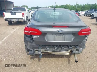 2018 Ford Focus SE with VIN 1FADP3F29JL288761, listed as a IAAI auction lot 42290510 with 93,463 mi miles and . Bid and sale history available at DreamBid. Image 6.