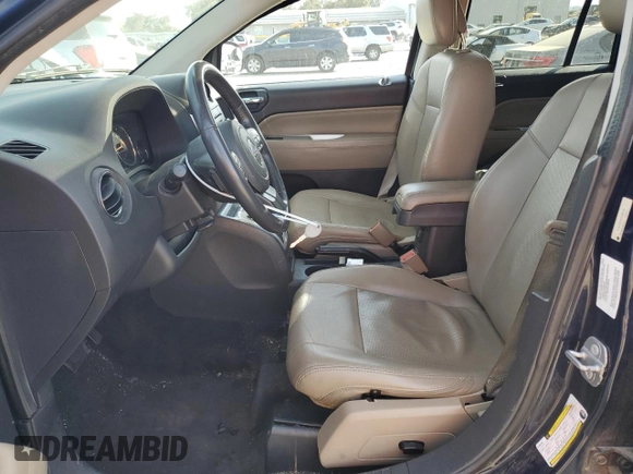 2014 Jeep Compass High Altitude with VIN 1C4NJCEA5ED790370, listed as a Copart auction lot 48593115 with 170,976 mi miles and Clean Title. Bid and sale history available at carsss.com. Image 7.