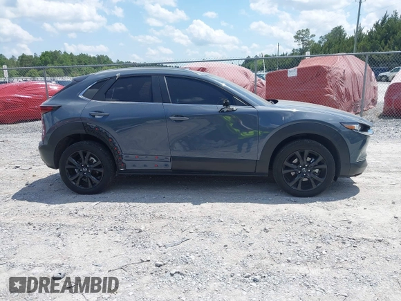 2024 Mazda CX-30 S Preferred with VIN 3MVDMBCM5RM648894, listed as a IAAI auction lot 42119860 with 23,857 mi miles and . Bid and sale history available at DreamBid. Image 13.