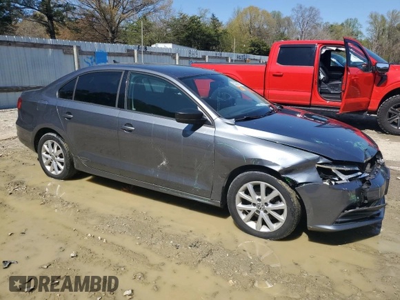 2015 Volkswagen Jetta SE with VIN 3VWD17AJXFM259533, listed as a Copart auction lot 52295555 with 170,886 mi miles and Salvage title. Bid and sale history available at DreamBid. Image 4.