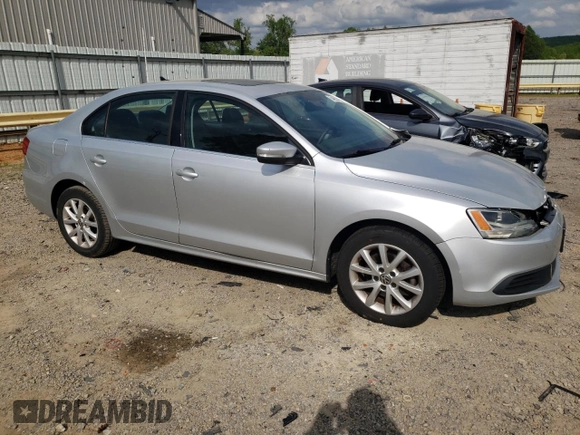 2013 Volkswagen Jetta SE with VIN 3VWDX7AJ6DM359415, listed as a Copart auction lot 54653435 with 189,463 mi miles and Clean title. Bid and sale history available at DreamBid. Image 4.