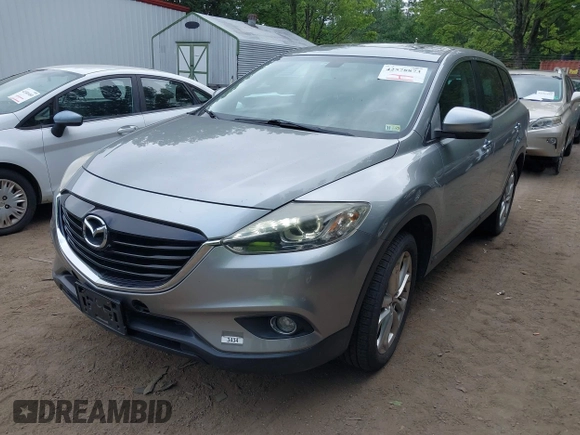 2013 Mazda CX-9 Grand Touring with VIN JM3TB3DV1D0409510, listed as a IAAI auction lot 42578873 with 154,570 mi miles and . Bid and sale history available at DreamBid. Image 2.