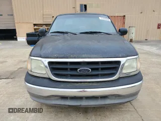 2003 Ford F-150 XL z VIN 1FTRX17W53NB84703, wystawiony jako Copart lot #51608895 z przebiegiem 291 806 mil mil oraz Szkoda całkowita • Salvage title. Historia ofert i sprzedaży dostępna na DreamBid. Obrazek 5.