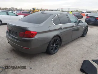 2014 BMW 5 Series 535d with VIN WBAXA5C58ED689864, listed as a IAAI auction lot 40983130 with 139,104 mi miles and . Bid and sale history available at carsss.com. Image 4.