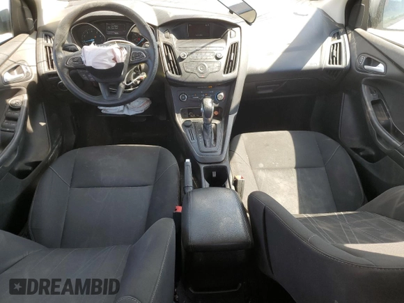 2018 Ford Focus SE with VIN 1FADP3F25JL324753, listed as a Copart auction lot 58624995 with 129,127 mi miles and Salvage title. Bid and sale history available at DreamBid. Image 8.