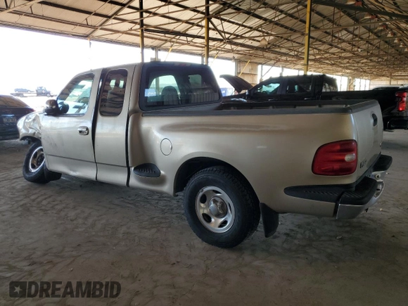 1999 Ford F-150 XL with VIN 1FTZX0722XKA93631, listed as a Copart auction lot 77263794 with Not provided miles and Salvage title. Bid and sale history available at DreamBid. Image 2.