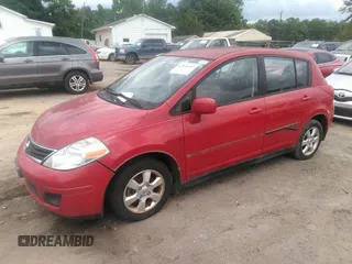 2012 Nissan Versa S with VIN 3N1BC1CP9CK250030, listed as a IAAI auction lot 42168452 with 197,685 mi miles. Bid and sale history available at carsss.com. Image 2.