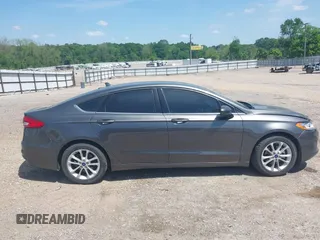 2020 Ford Fusion SE z VIN 3FA6P0H79LR118534, wystawiony jako IAAI lot #42065215 z przebiegiem 104 202 mil mil oraz . Historia ofert i sprzedaży dostępna na DreamBid. Obrazek 14.
