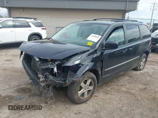 2010 Dodge Grand Caravan SXT with VIN 2D4RN5D13AR427353, listed as a IAAI auction lot 42180594 with 191,535 mi miles and . Bid and sale history available at DreamBid. Image 2.