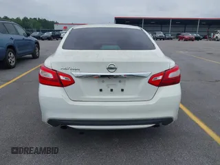 2016 Nissan Altima S z VIN 1N4AL3APXGN345029, wystawiony jako IAAI lot #42359083 z przebiegiem 210 555 mil mil oraz . Historia ofert i sprzedaży dostępna na DreamBid. Obrazek 16.