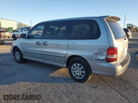 2004 Kia Sedona LX with VIN KNDUP131546611507, listed as a Copart auction lot 82050794 with 200,426 mi miles and Clean Title. Bid and sale history available at carsss.com. Image 2.