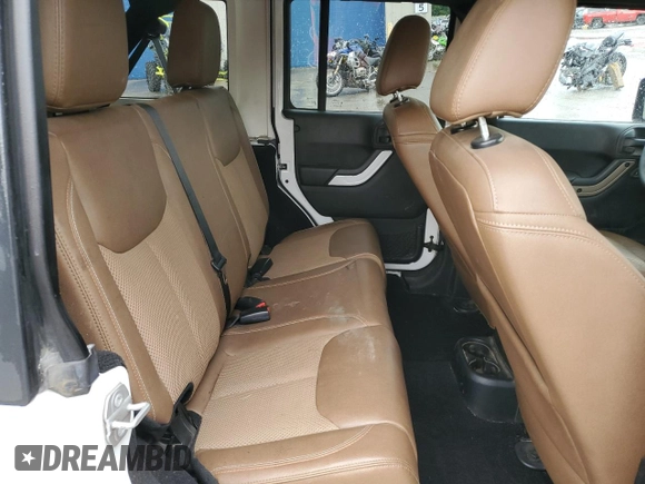 2016 Jeep Wrangler Unlimited Sahara with VIN 1C4BJWEGXGL245041, listed as a Copart auction lot 88099245 with 134,768 mi miles and Salvage title. Bid and sale history available at DreamBid. Image 10.