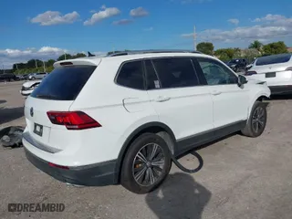 2019 Volkswagen Tiguan SE with VIN 3VV3B7AX9KM067418, listed as a IAAI auction lot 41434045 with 96,968 mi miles. Bid and sale history available at carsss.com. Image 4.