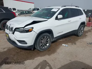 2019 Jeep Cherokee Latitude Plus with VIN 1C4PJLLB0KD307741, listed as a IAAI auction lot 41750370 with 76,036 mi miles. Bid and sale history available at carsss.com. Image 17.