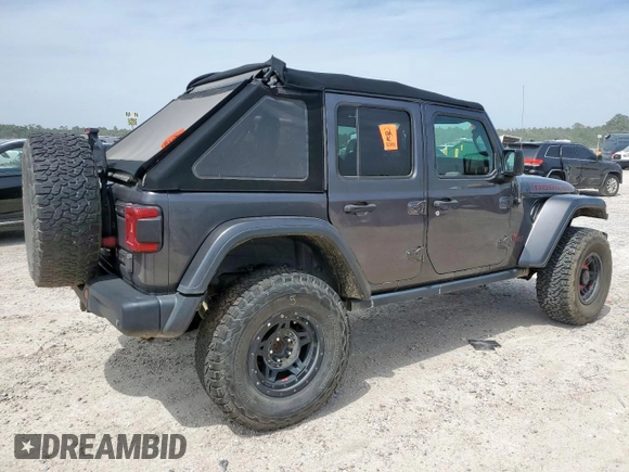 2018 Jeep Wrangler Unlimited Rubicon with VIN 1C4HJXFG6JW166731, listed as a Copart auction lot 56997385 with 117,713 mi miles and Salvage title. Bid and sale history available at DreamBid. Image 3.