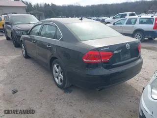 2012 Volkswagen Passat SE w/Sunroof with VIN 1VWBH7A32CC075642, listed as a IAAI auction lot 41800570 with 187,180 mi miles. Bid and sale history available at carsss.com. Image 3.
