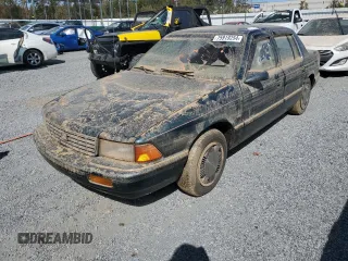 1993 Plymouth Acclaim z VIN 1P3XA4634PF673210, wystawiony jako Copart lot #75919254 z przebiegiem 186 440 mil mil oraz Szkody całkowita. Historia ofert i sprzedaży dostępna na DreamBid. Obrazek 1.