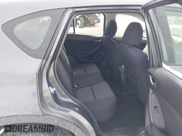 2013 Mazda CX-5 Sport z VIN JM3KE2BE9D0156274, wystawiony jako IAAI lot #41624466 z przebiegiem 159 017 mil mil oraz . Historia ofert i sprzedaży dostępna na DreamBid. Obrazek 8.