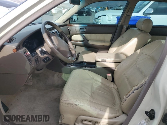1998 Infiniti Q45 z VIN JNKBY31A8WM403038, wystawiony jako Copart lot #86904484 z przebiegiem 136 142 mil mil oraz Szkoda całkowita • Salvage title. Historia ofert i sprzedaży dostępna na DreamBid. Obrazek 7.