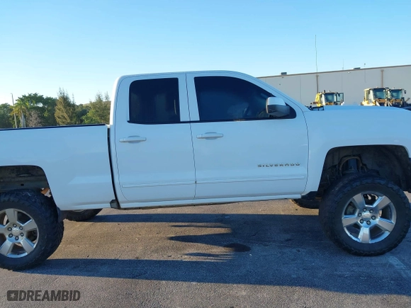 2017 Chevrolet Silverado 1500 LT with VIN 1GCVKREC7HZ216507, listed as a IAAI auction lot 41828407 with 138,294 mi miles. Bid and sale history available at carsss.com. Image 13.