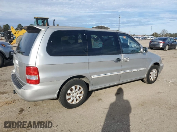 2005 Kia Sedona LX with VIN KNDUP132X56721558, listed as a Copart auction lot 88574685 with 176,660 mi miles and Salvage Title. Bid and sale history available at carsss.com. Image 3.