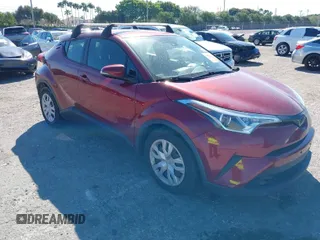 2019 Toyota C-HR XLE with VIN JTNKHMBX5K1044846, listed as a IAAI auction lot 41670614 with 52,374 mi miles. Bid and sale history available at carsss.com. Image 1.