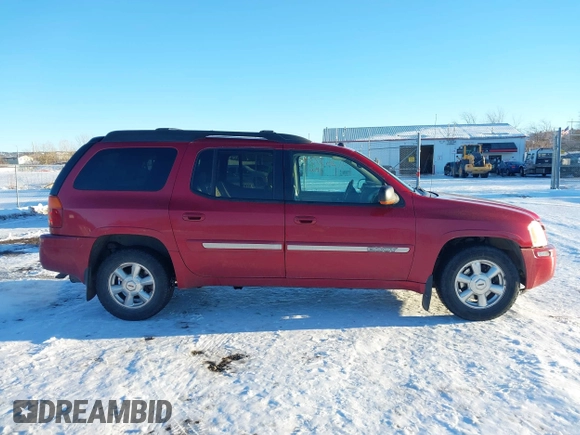 2005 GMC Envoy SLE with VIN 1GKET16S056147701, listed as a IAAI auction lot 41263739 with 179,455 mi miles. Bid and sale history available at carsss.com. Image 13.