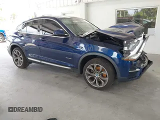 2015 BMW X4 xDrive28i z VIN 5UXXW3C51F0M87268, wystawiony jako IAAI lot #42366363 z przebiegiem 143 285 mil mil oraz . Historia ofert i sprzedaży dostępna na DreamBid. Obrazek 1.