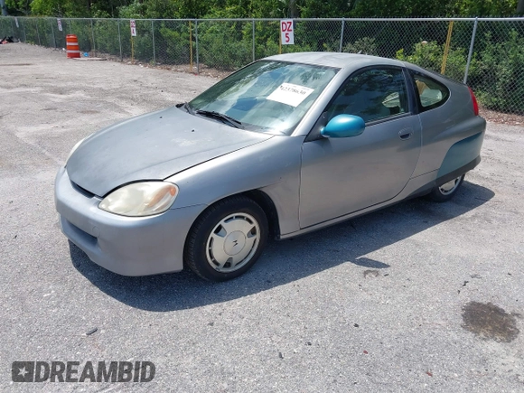 2004 Honda Insight z VIN JHMZE14744T000527, wystawiony jako IAAI lot #42378630 z przebiegiem 1 360 mil mil oraz . Historia ofert i sprzedaży dostępna na DreamBid. Obrazek 17.