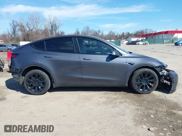 2023 Tesla Model Y Long Range with VIN 7SAYGDEE2PF883687, listed as a IAAI auction lot 41589837 with 36,890 mi miles. Bid and sale history available at carsss.com. Image 14.