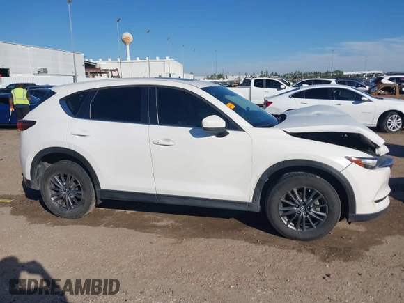 2019 Mazda CX-5 Touring with VIN JM3KFACM4K1668352, listed as a IAAI auction lot 41481291 with 65,901 mi miles and . Bid and sale history available at carsss.com. Image 13.