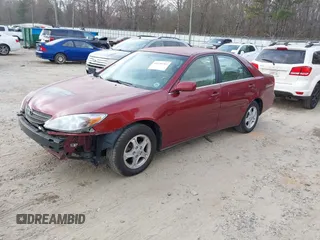2002 Toyota Camry LE z VIN 4T1BE32K82U005531, wystawiony jako IAAI lot #41650283 z przebiegiem 328 259 mil mil oraz . Historia ofert i sprzedaży dostępna na DreamBid. Obrazek 2.