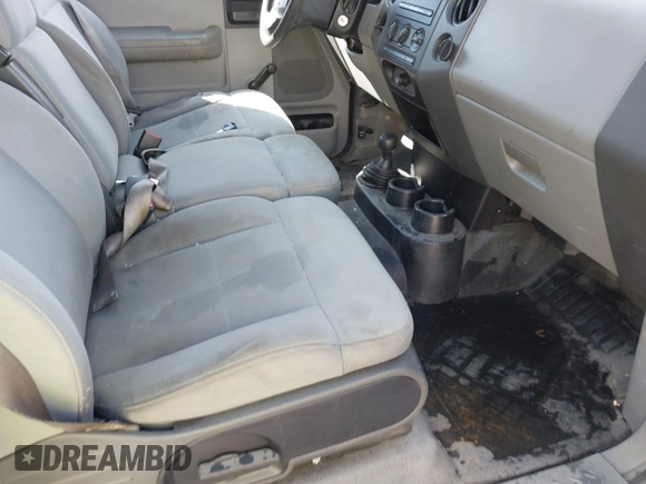 2007 Ford F-150 STX with VIN 1FTRX14W87FA14579, listed as a IAAI auction lot 40503694 with 164,718 mi miles. Bid and sale history available at carsss.com. Image 5.
