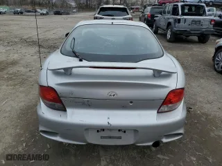 2001 Hyundai Tiburon with VIN KMHJG35F31U224416, listed as a Copart auction lot 83243684 with 59,473 mi miles and Salvage Title. Bid and sale history available at carsss.com. Image 6.