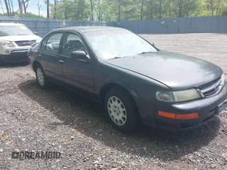 1998 Nissan Maxima GXE z VIN JN1CA21D2WM923835, wystawiony jako IAAI lot #42221419 z przebiegiem 256 441 mil mil oraz . Historia ofert i sprzedaży dostępna na DreamBid. Obrazek 1.