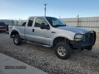 2003 Ford F-350 XL with VIN 1FTSX31P83ED38187, listed as a Copart auction lot 44034145 with 363,297 mi miles and Salvage Title. Bid and sale history available at DreamBid. Image 4.